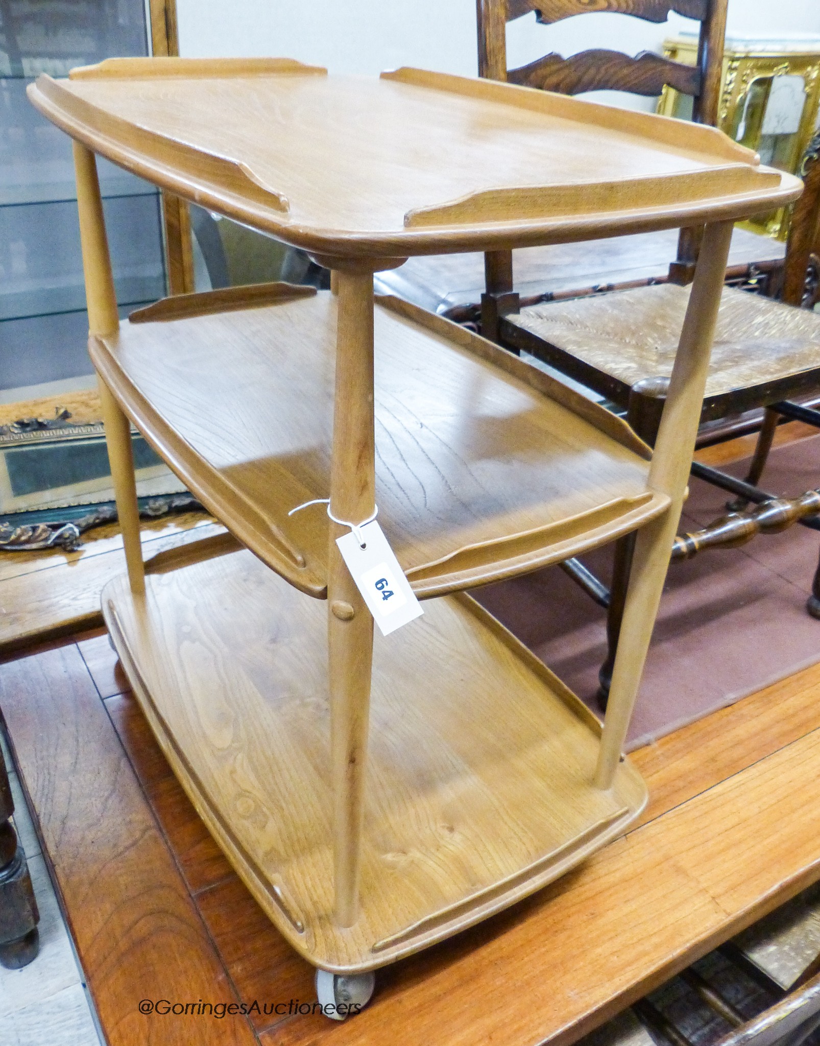 An Ercol light elm and beech three tier trolley, length 72cm, width 46cm, height 77cm